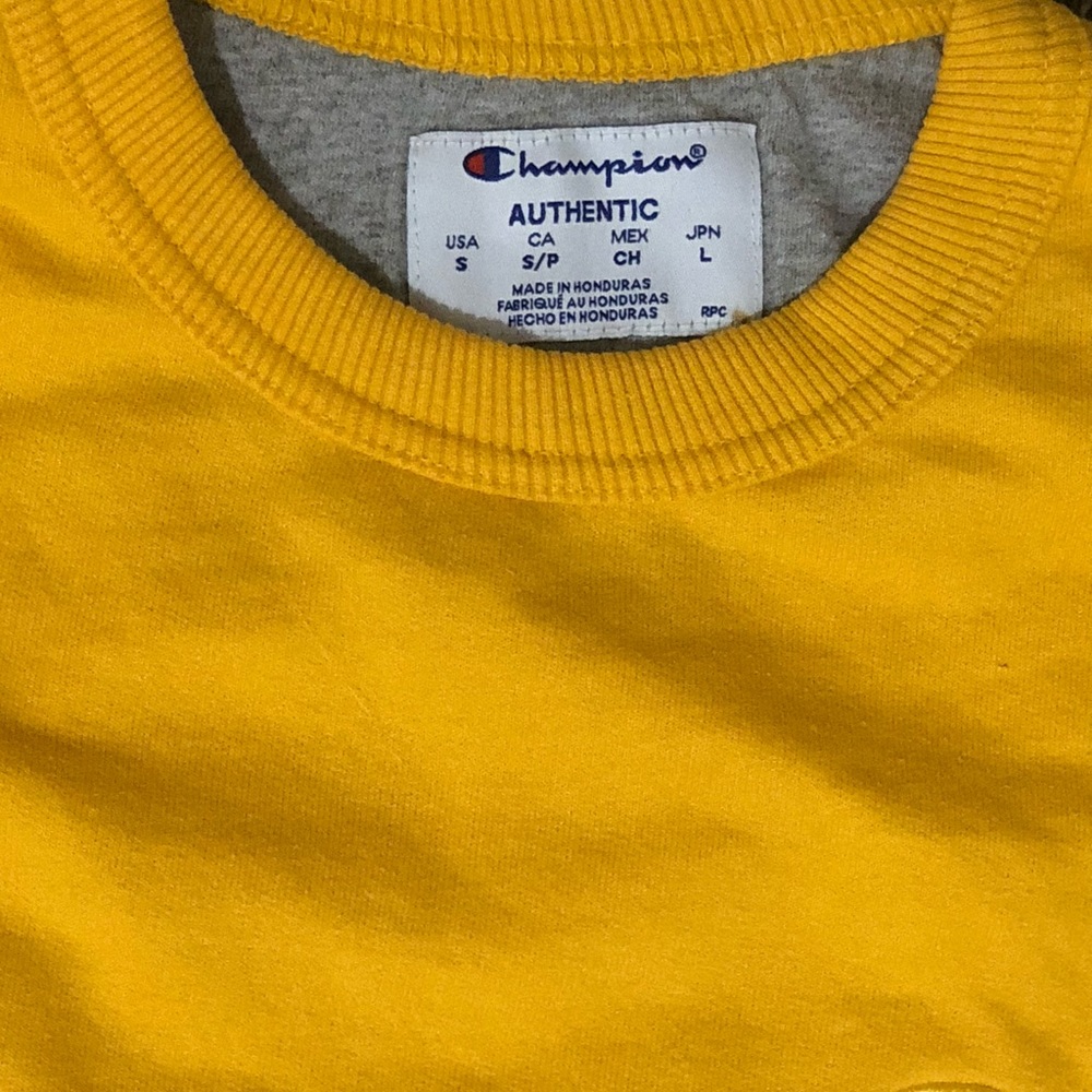 This is a yellow/orange champion hoodie only has been worn about 3 times.
